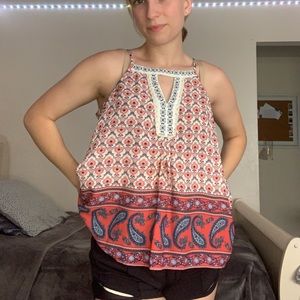 Flowy tank top with cute design and details